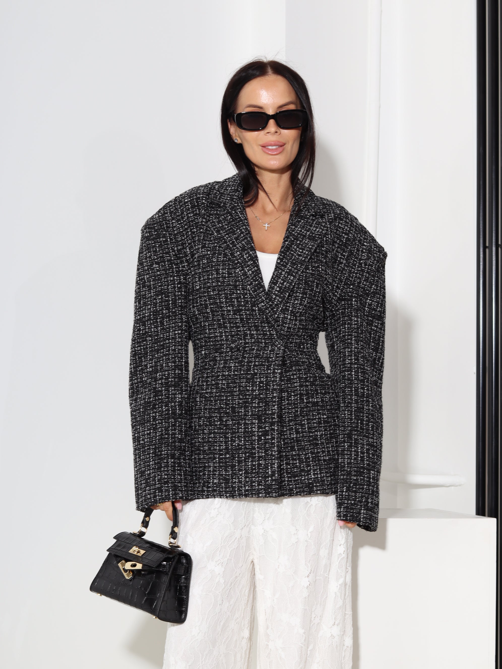 Melna tvīda auduma žakete, sienama mugurpusē - 18591