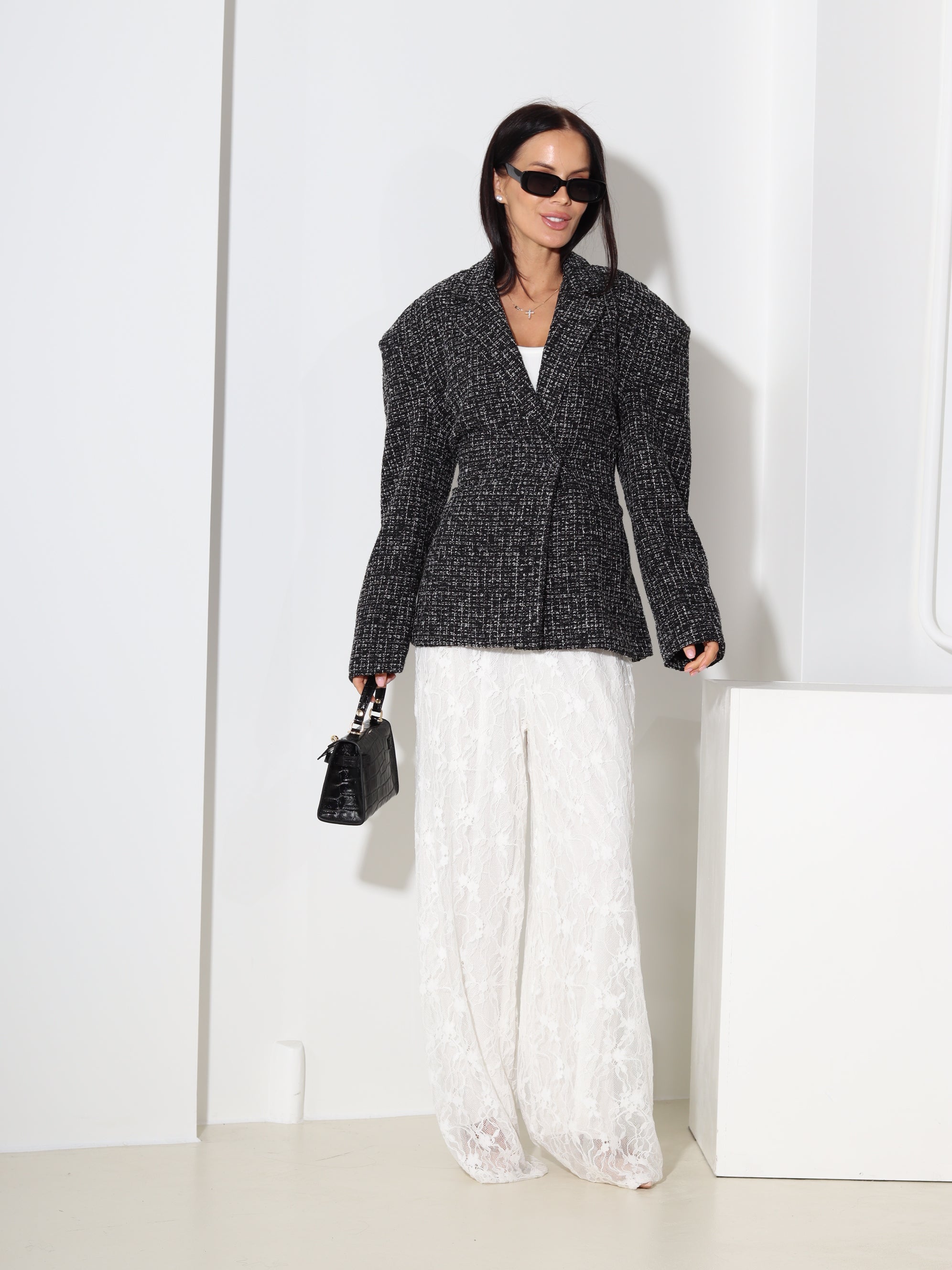 Melna tvīda auduma žakete, sienama mugurpusē - 18591