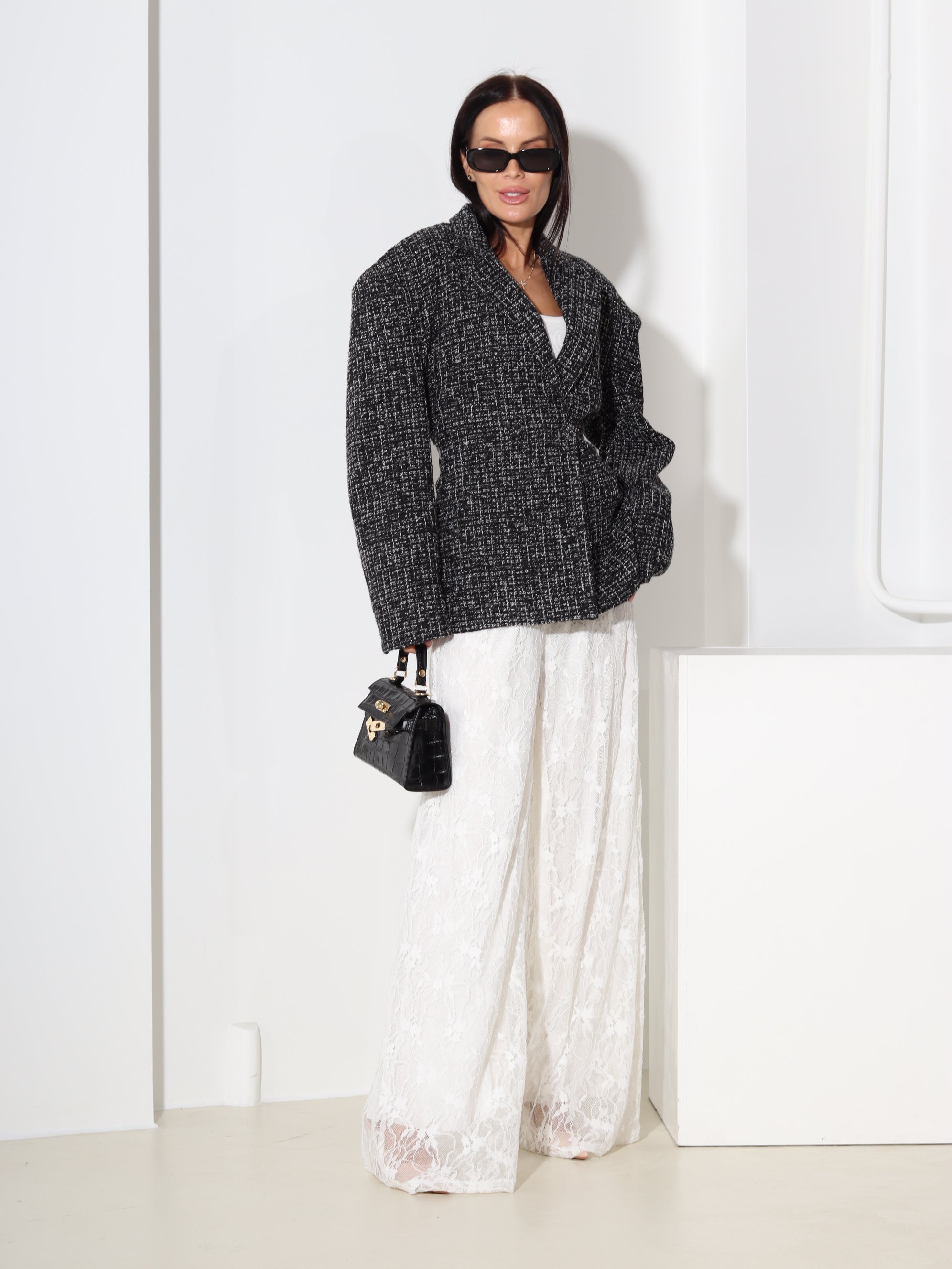 Melna tvīda auduma žakete, sienama mugurpusē - 18591