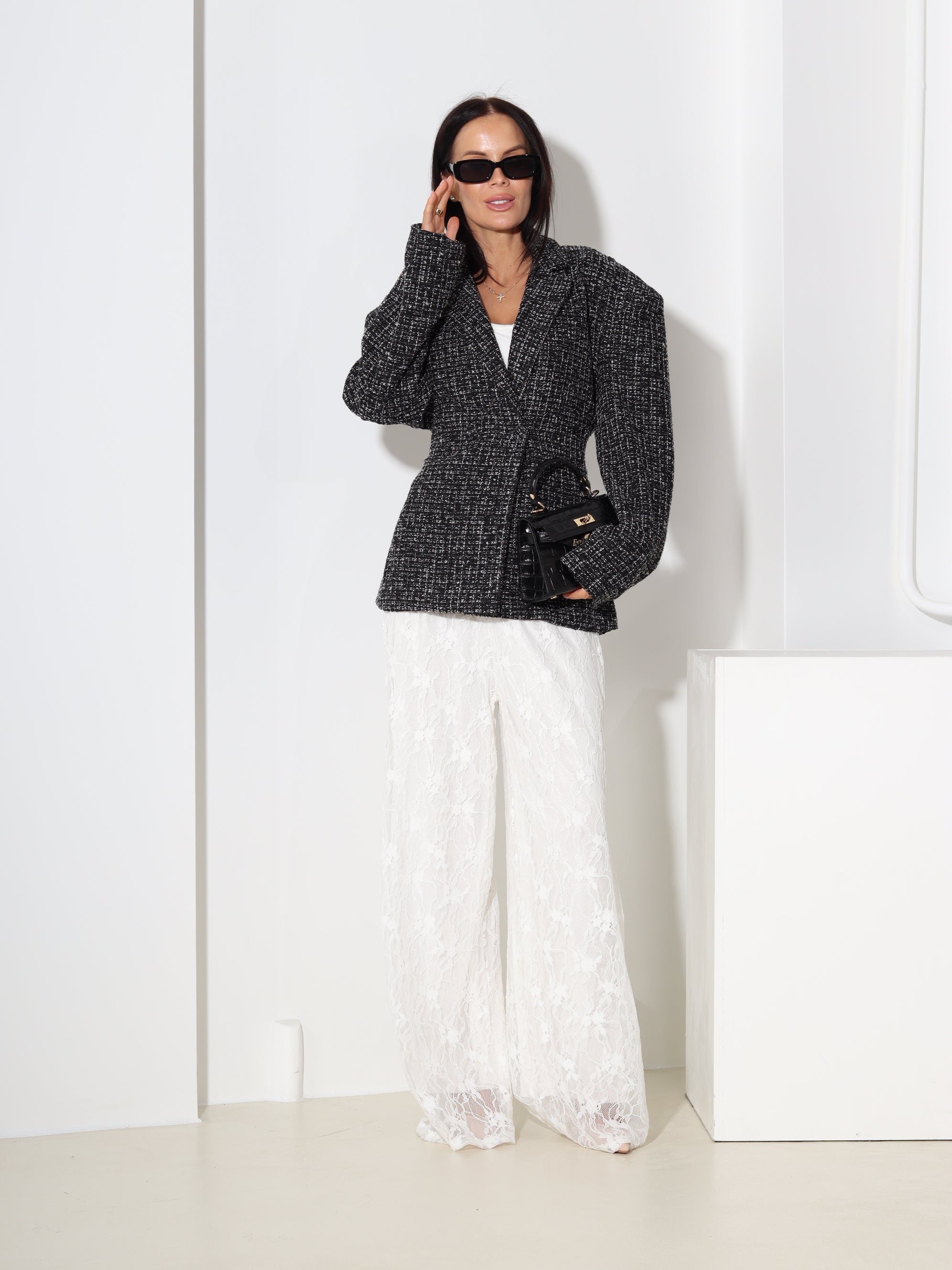 Melna tvīda auduma žakete, sienama mugurpusē - 18591