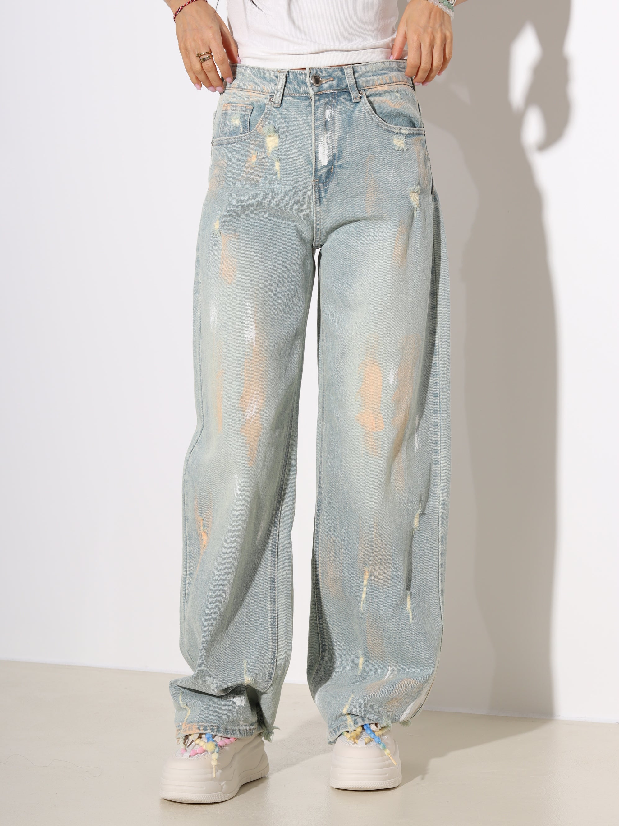 Zaļganzilas džinsu bikses ar plēsumu un un krāsu akcentiem- 19016