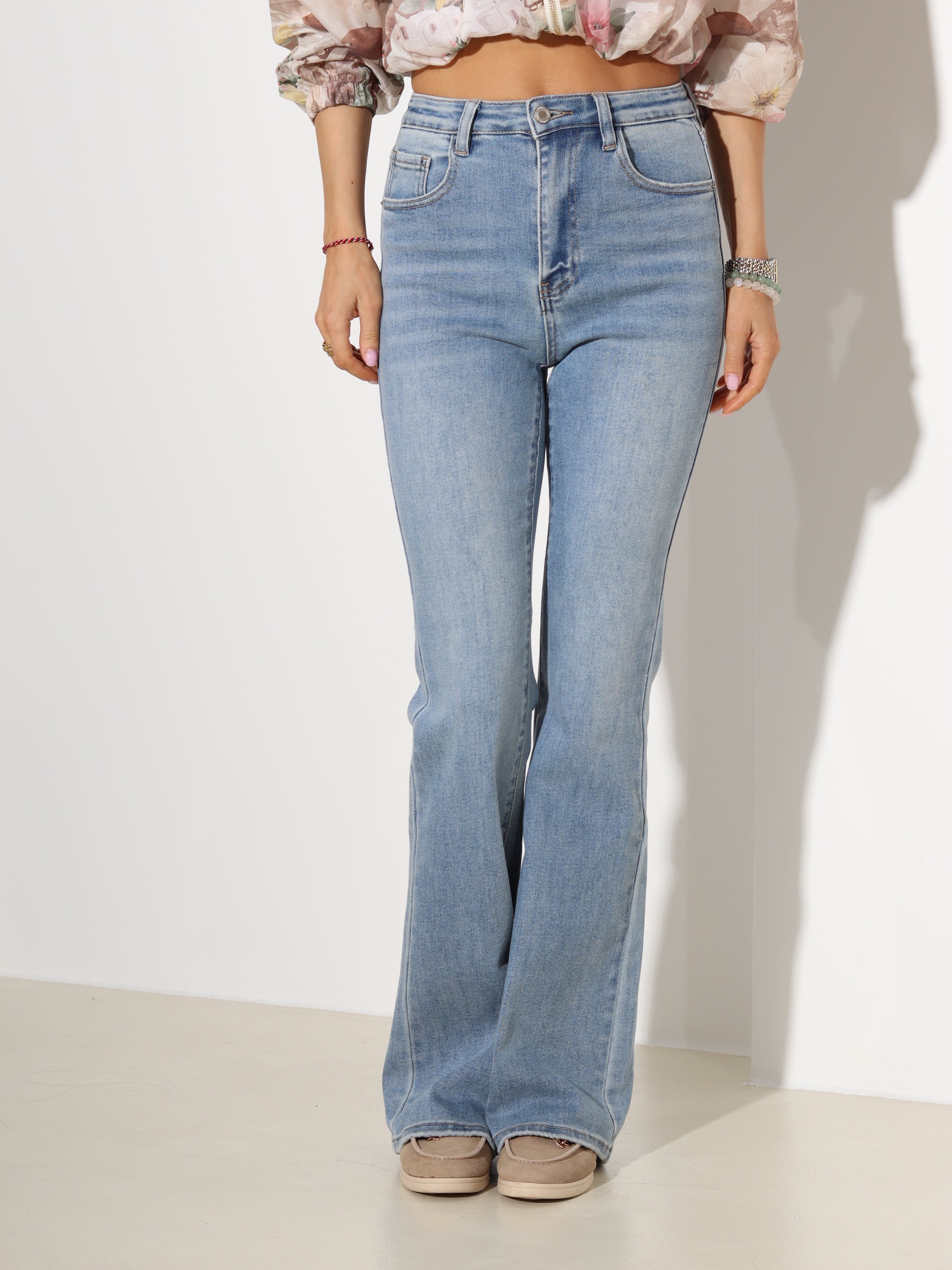 Zilas "Laulia" džinsu bikses ar paplatinātiem bikšu staru galiem- 19094