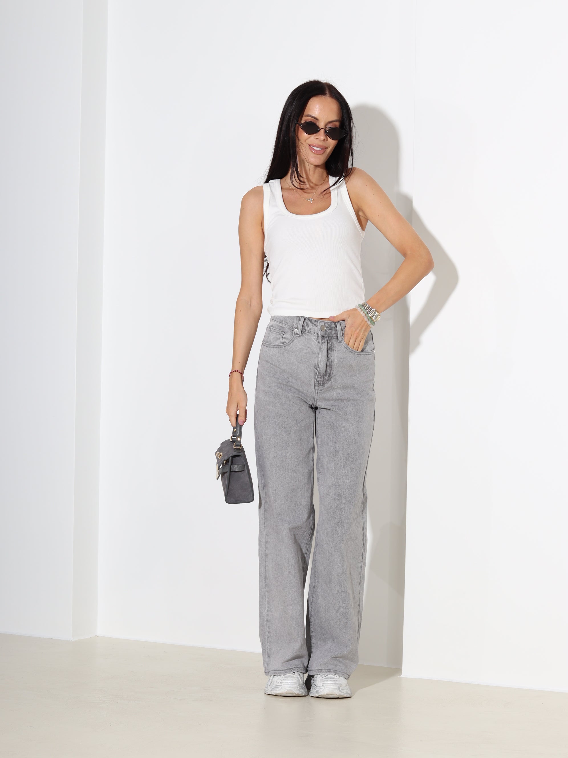 Pelēkas džinsa püksid ar paplatinātiem stariem - 18170