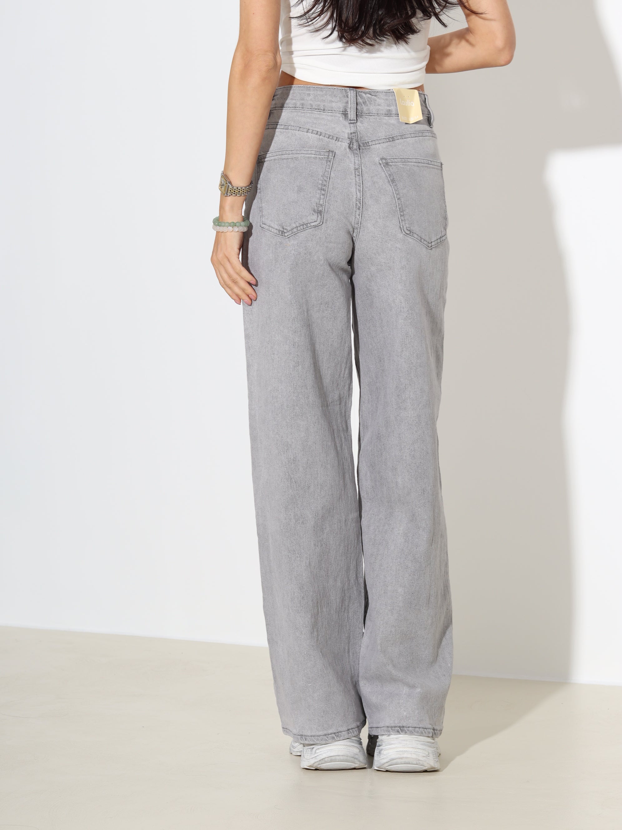 Pelēkas džinsa püksid ar paplatinātiem stariem - 18170