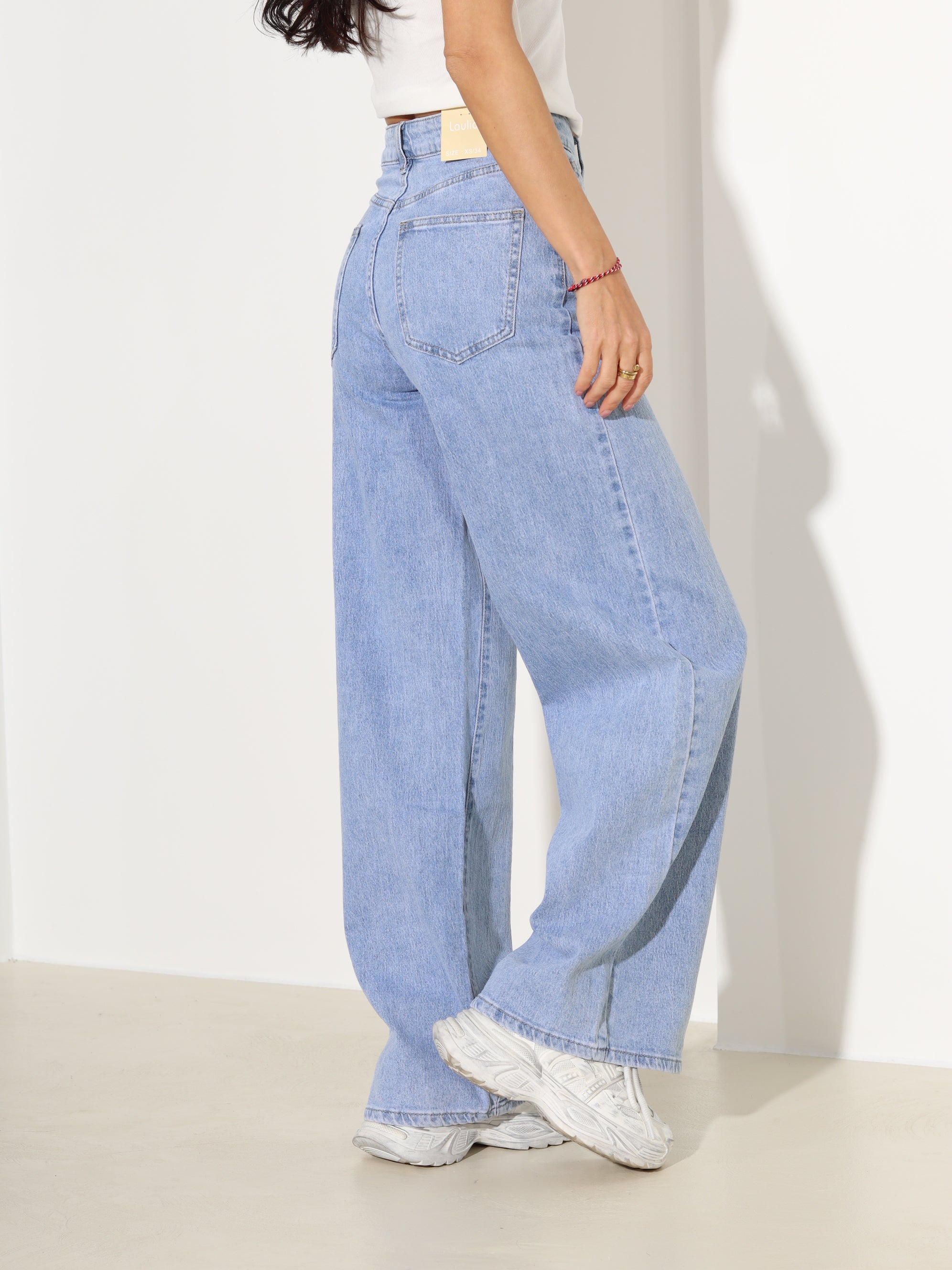 Zilas džinsa püksid ar paplatinātiem stariem - 18171