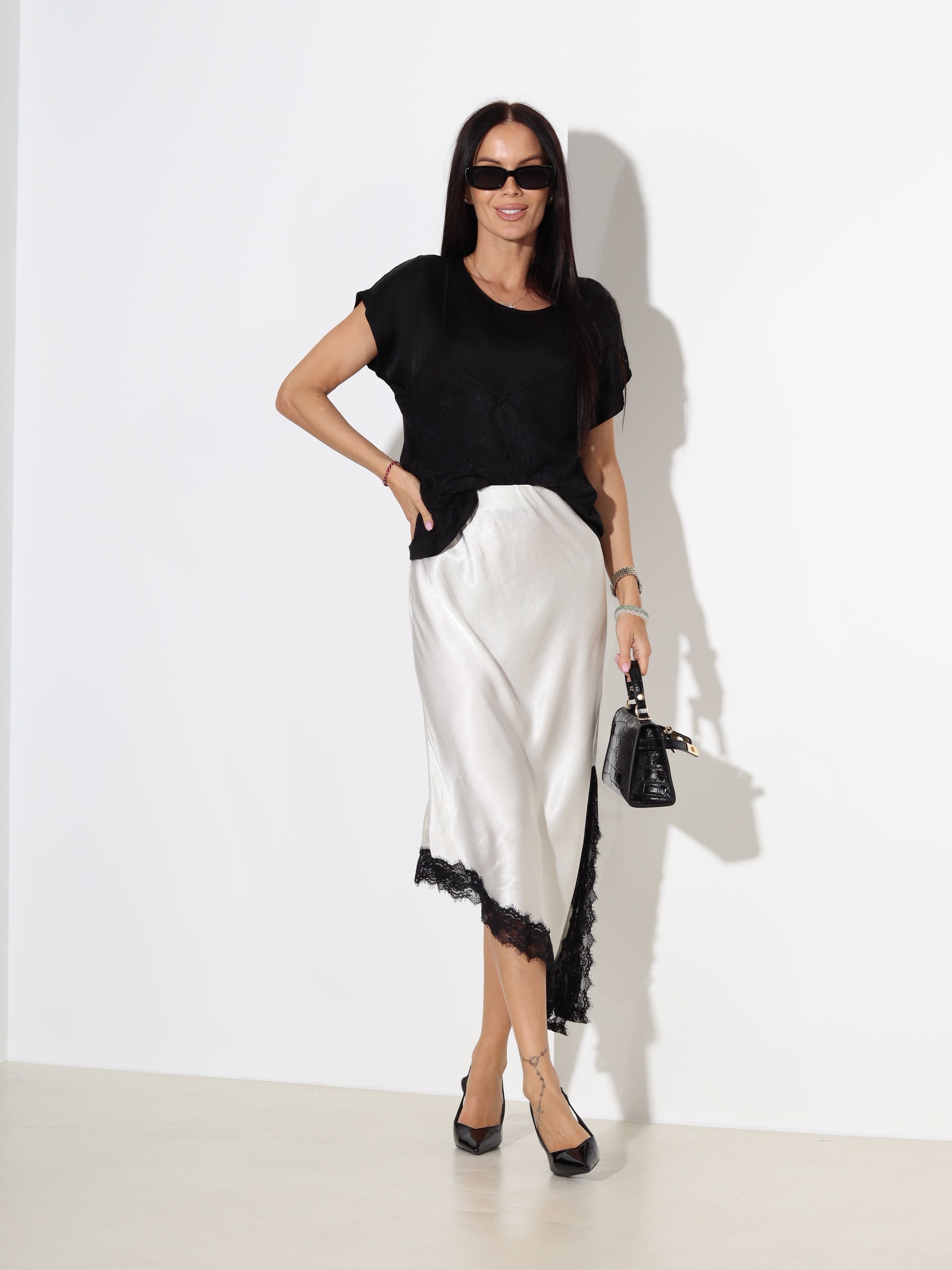 Balti viskozes svārki ar slīpu apakšmalu - 18486