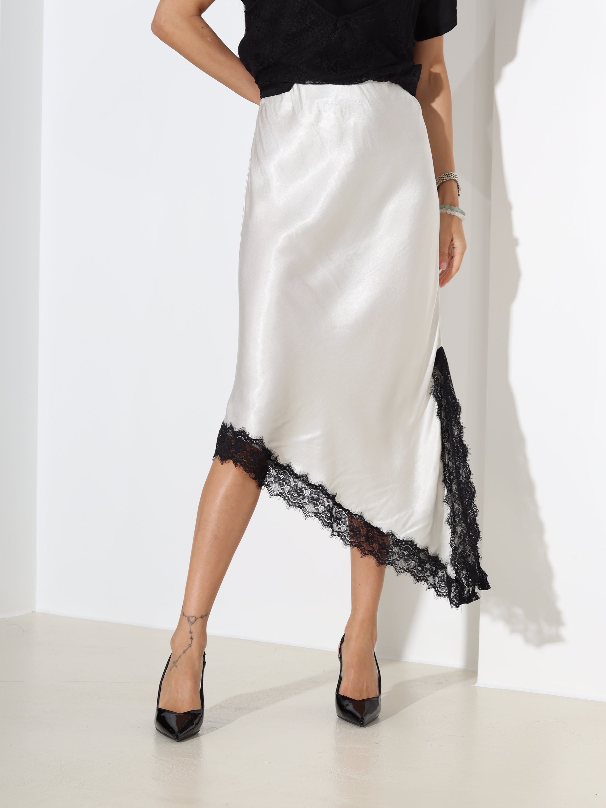 Balti viskozes svārki ar slīpu apakšmalu - 18486