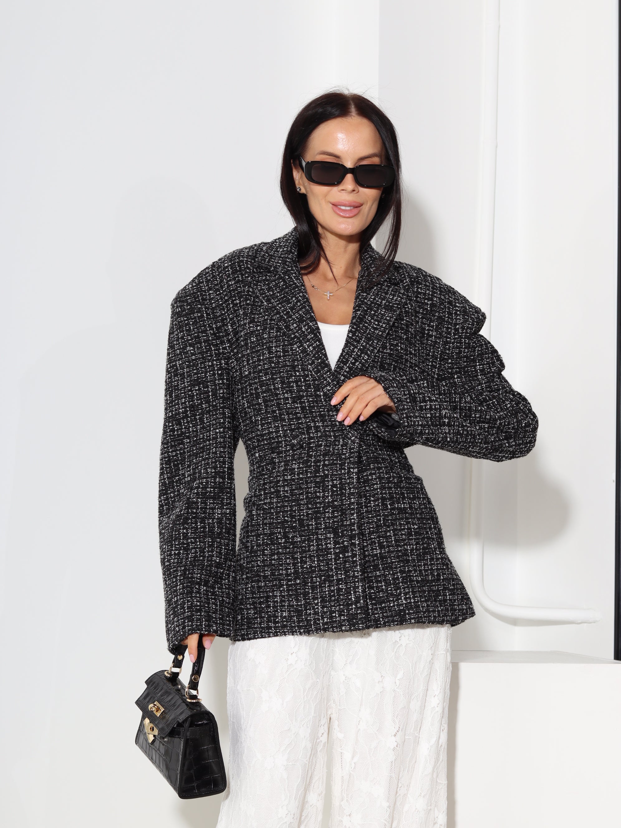 Melna tvīda auduma žakete, sienama mugurpusē - 18591