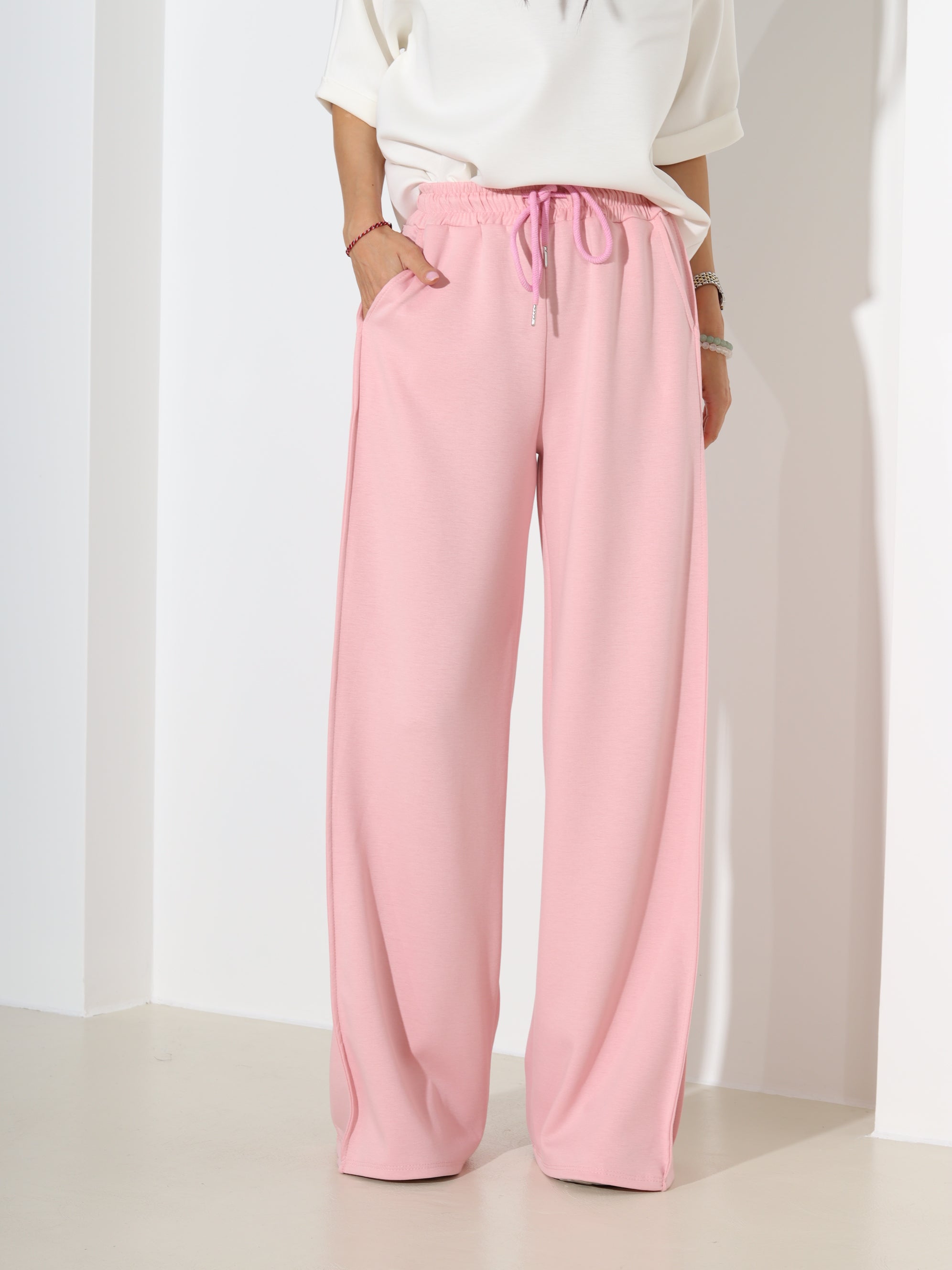 Rozā sportiska stila bikses ar papildus iešumumu- 18417