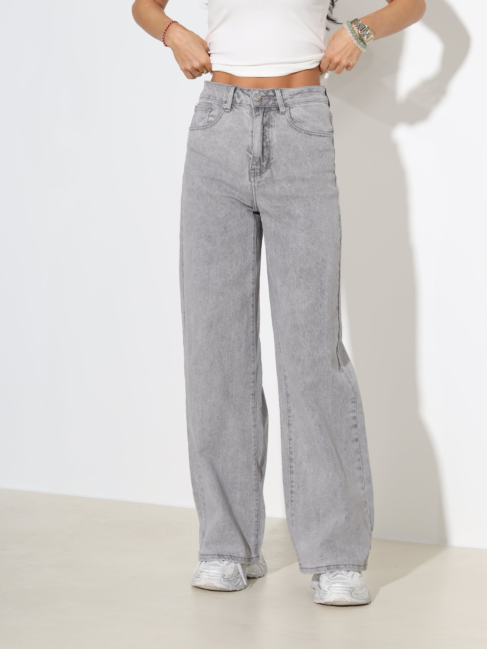 Pelēkas džinsa püksid ar paplatinātiem stariem - 18170