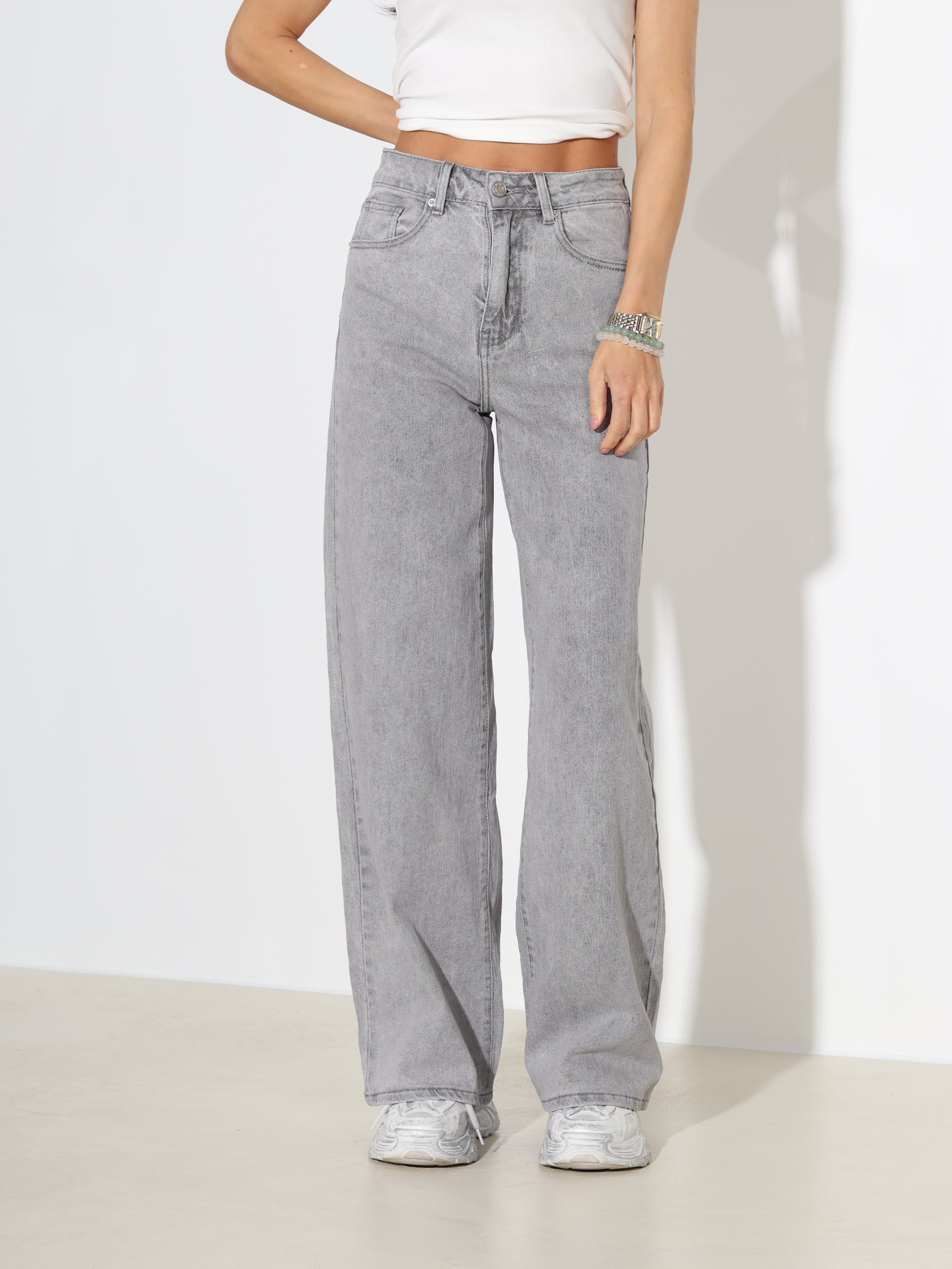 Pelēkas džinsa püksid ar paplatinātiem stariem - 18170