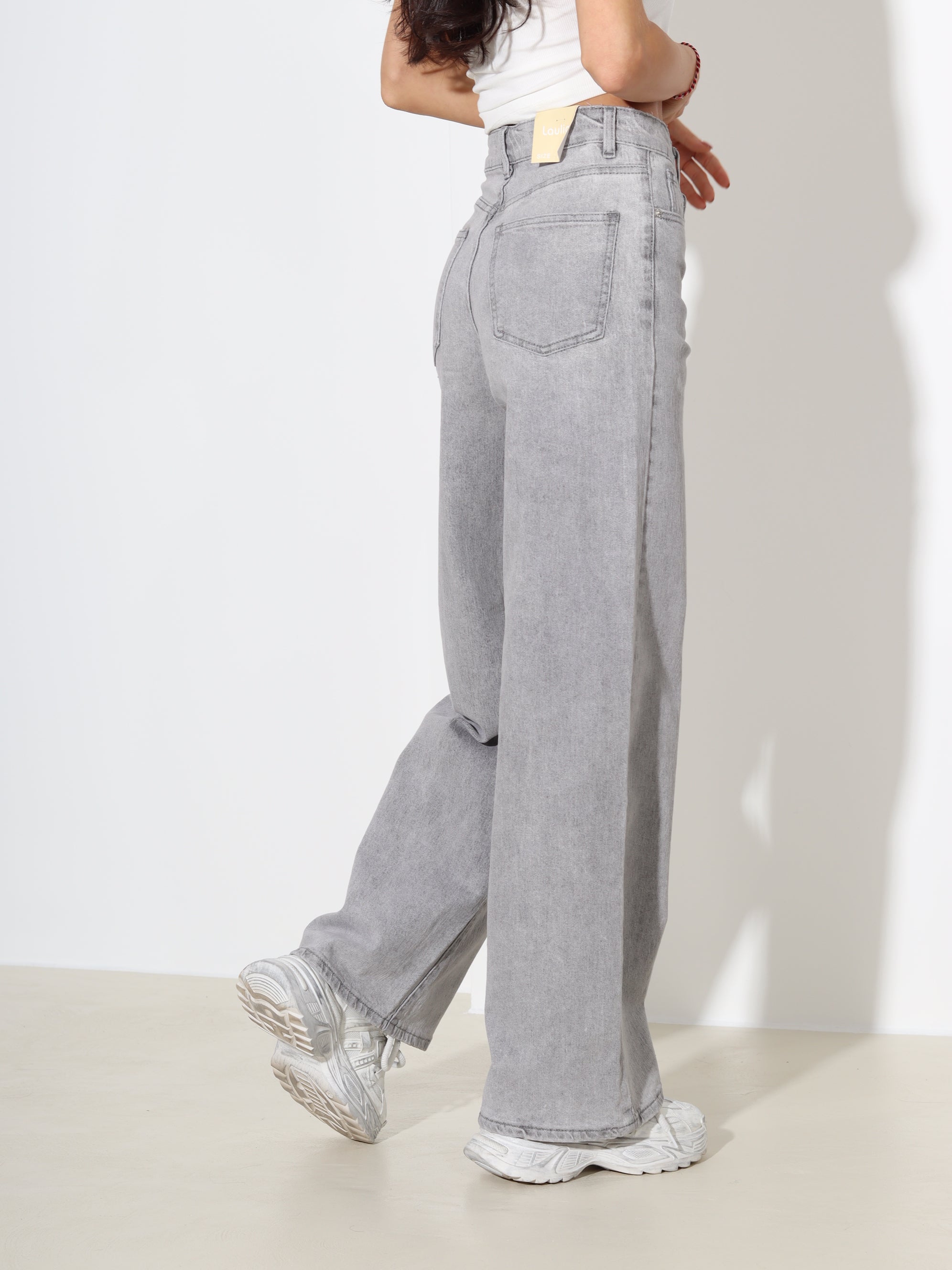 Pelēkas džinsa püksid ar paplatinātiem stariem - 18170