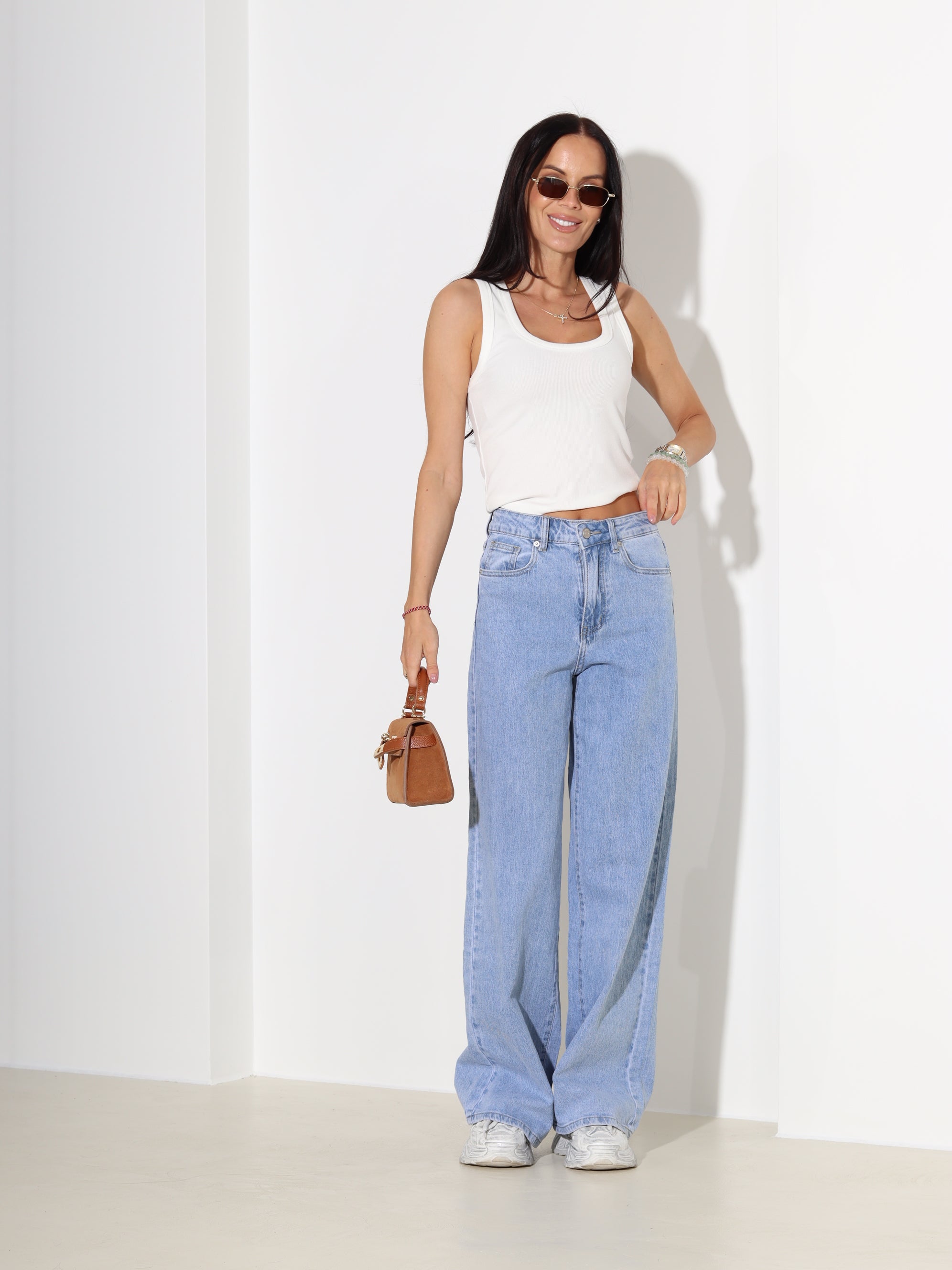 Zilas džinsa püksid ar paplatinātiem stariem - 18171