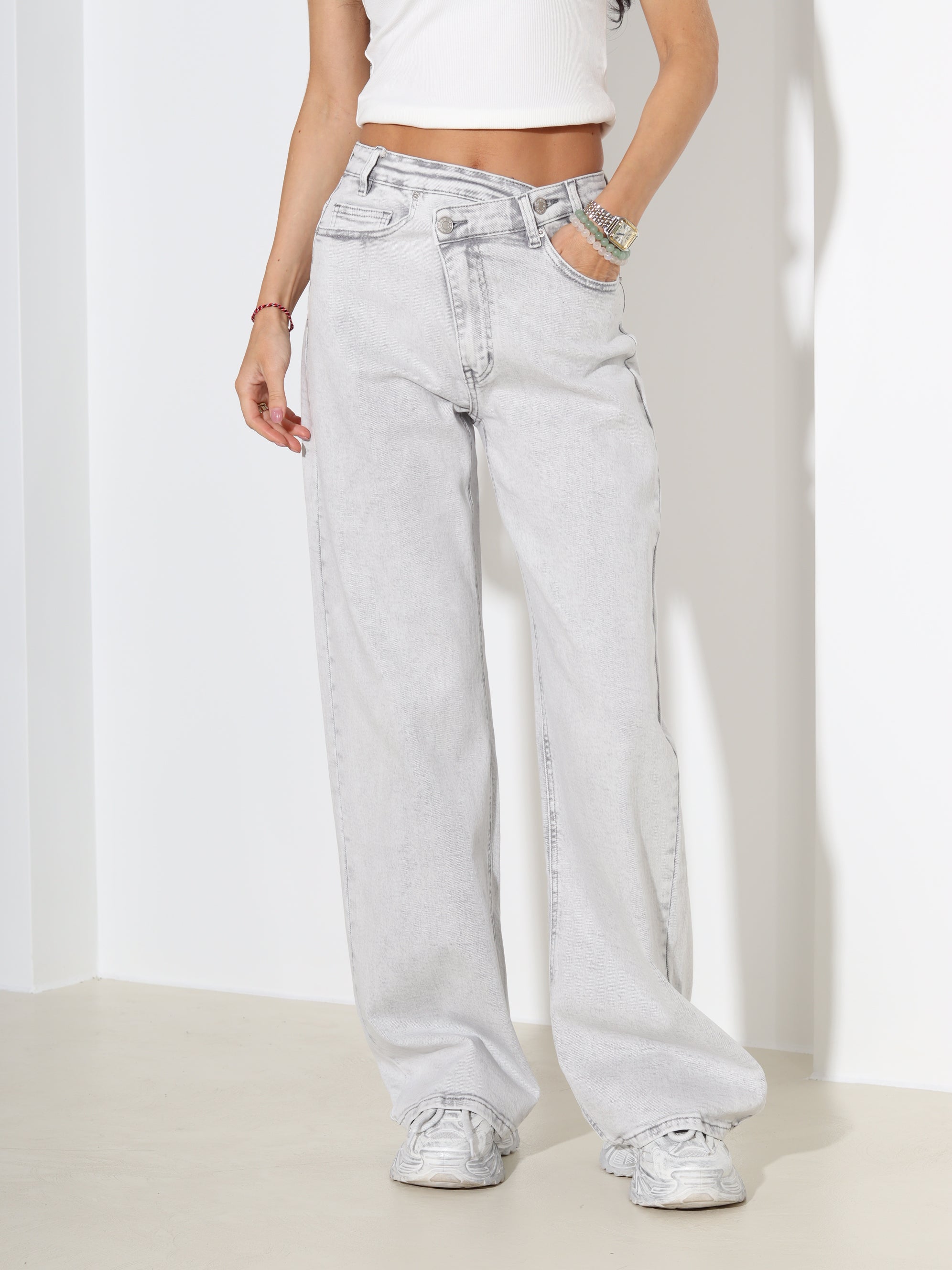 G.pelēkas džinsa püksid ar slīpu pogas aizdari - 18168