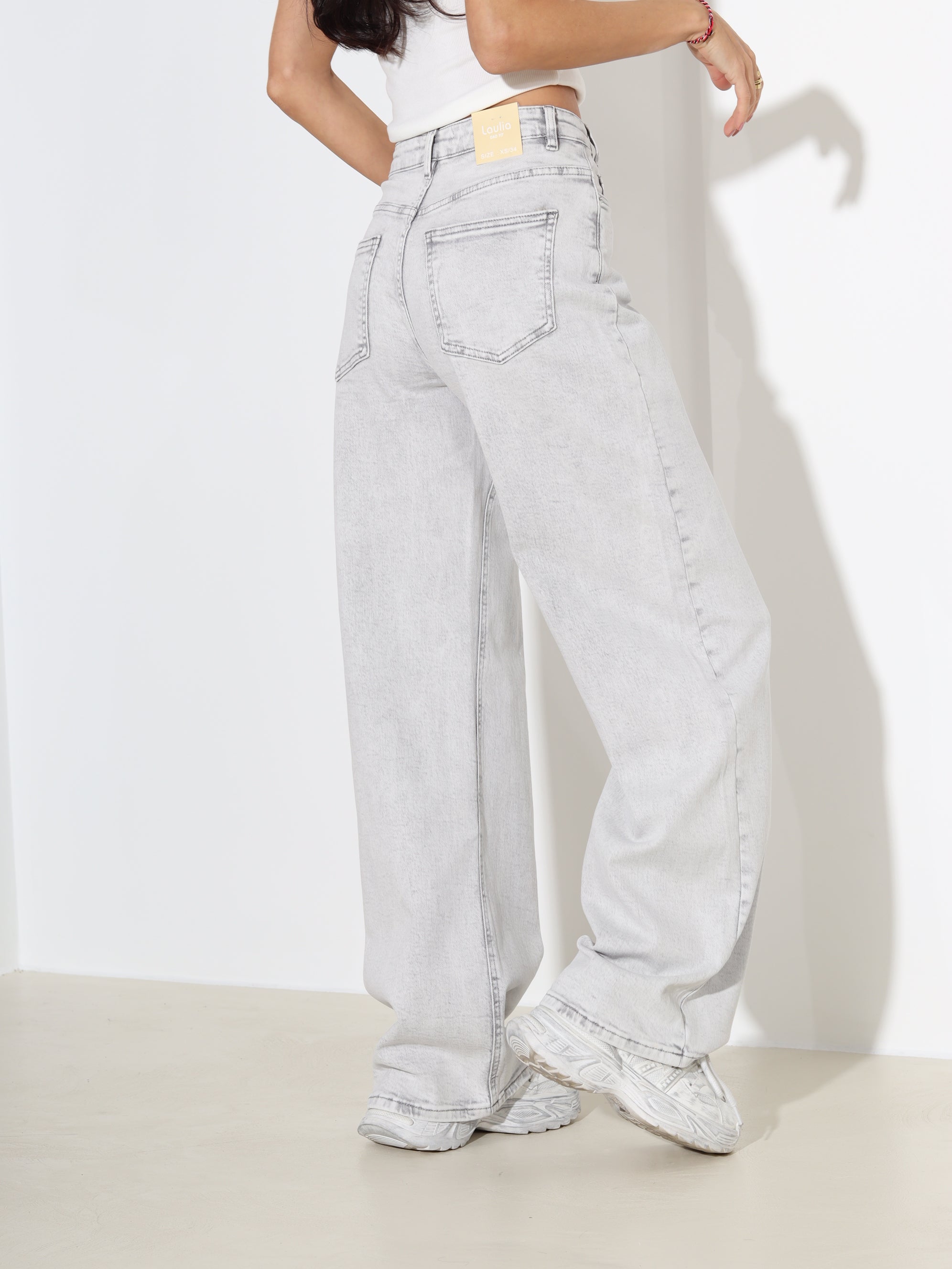 G.pelēkas džinsa püksid ar slīpu pogas aizdari - 18168