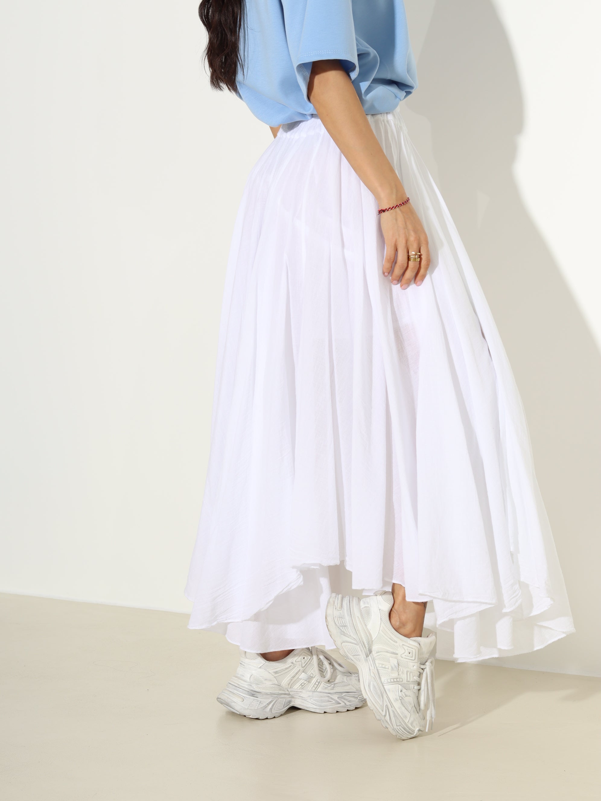 Balti, kupli midi svārki ar asimetrisku apakšmalu - 18758