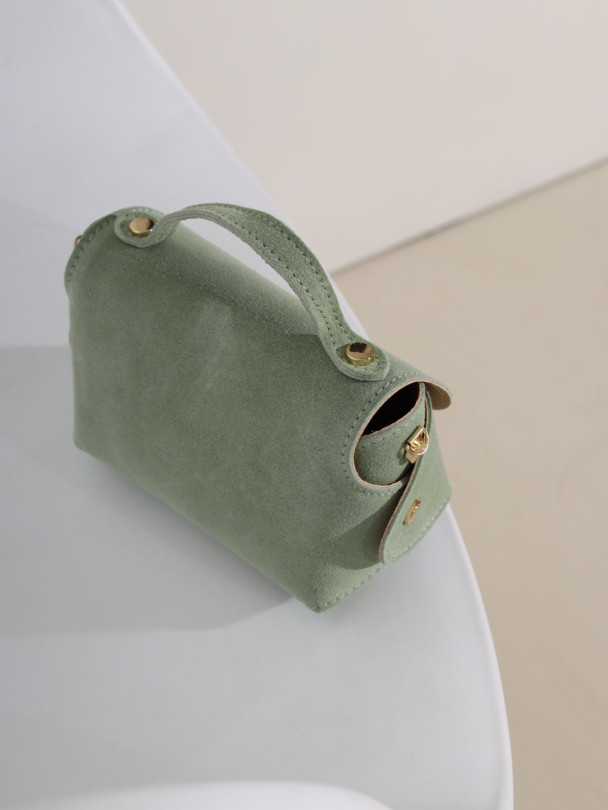 Zaļa d/zamšādas mini stilizēta soma - 19110