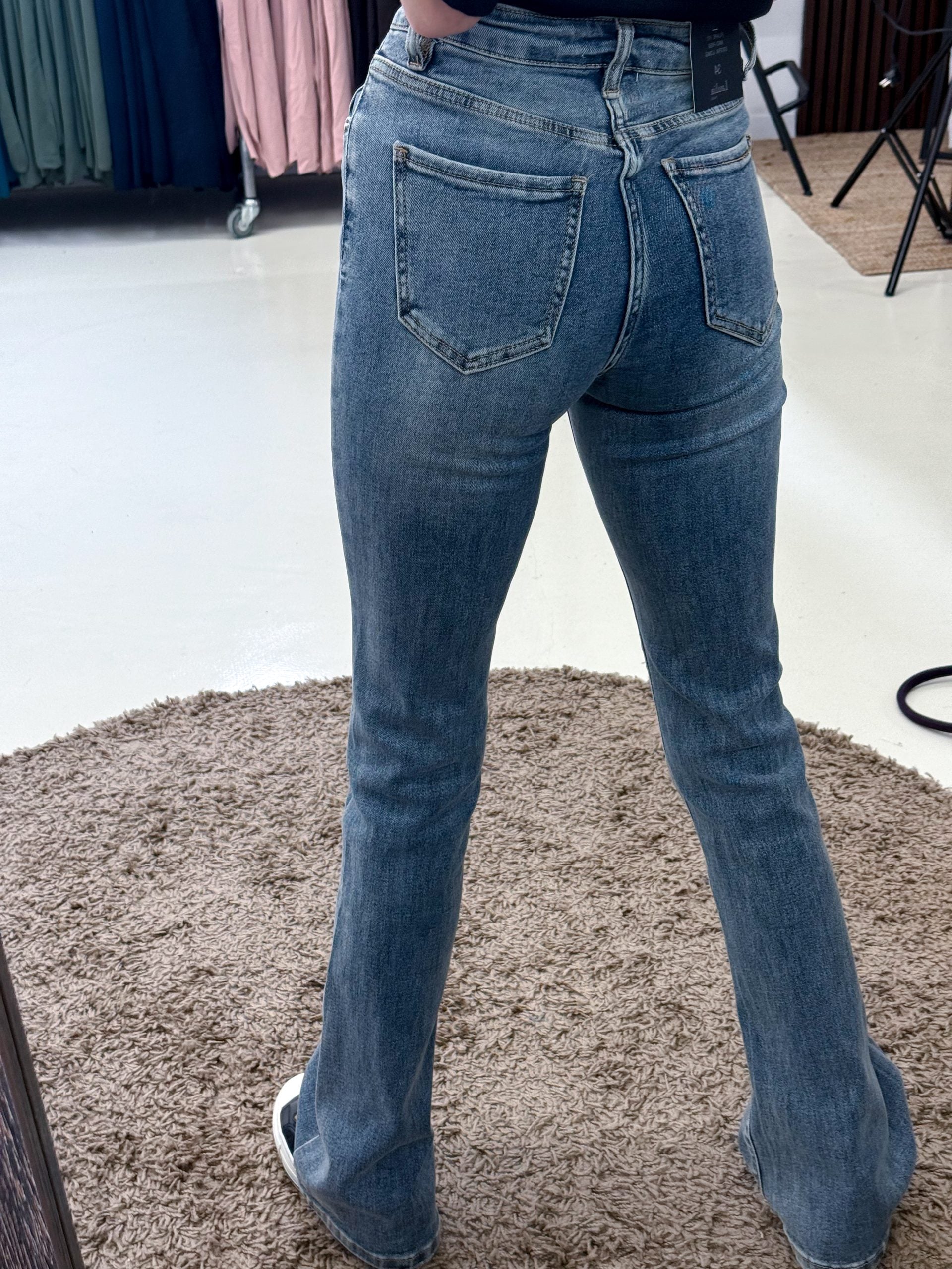 Zilas džinsa bikses ar paplatinātiem galiem - 14957